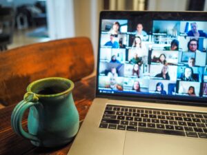 Laptop with Zoom meeting on screen. Photo by Chris Montgomery on Unsplash.